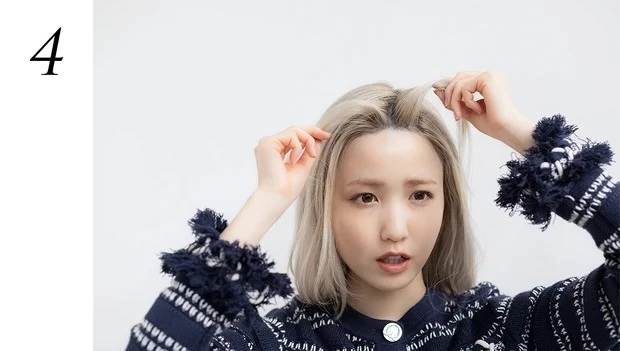 本田仁美さんのヘアアレンジ・前髪スタイリングのポイントは?_4. カーラーを毛流れに逆らうようにはずし、2つの束にブロッキングする。