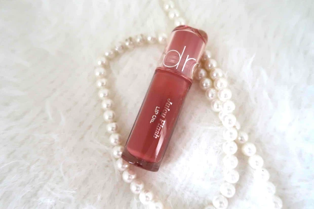 ロムアンド ジューシーフラッシュリップオイル 05 ペアベージュ パッケージ