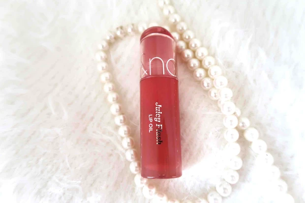 ロムアンド ジューシーフラッシュリップオイル 03 ピーチストローブ パッケージ