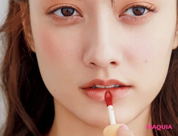 オレンジ✕パープルのレイヤードメイク リップ