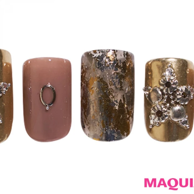 スタッズに遊び心を込めた、アーティスティックなビッグ「スター」ネイル