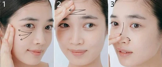 【日焼け止めの塗り方】手の甲に出したパール粒1/3の量を中指と薬指に取り、第２関節まで使って、頬の上部と下部で内側から外側へ放射状に塗り広げ、フェイスラインにもなじませる