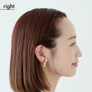 【ミディアム②きちんとスーツ】顔まわりのねじりがアクセントの上品ダウンスタイル（right）