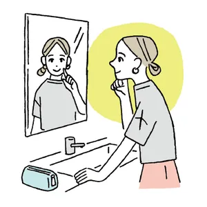 メイク直しをするときに鏡で自分の顔を見る