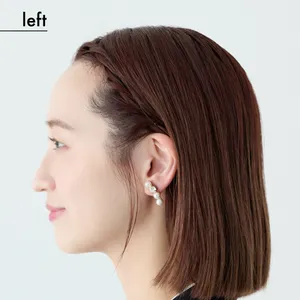 【ミディアム②きちんとスーツ】顔まわりのねじりがアクセントの上品ダウンスタイル（left）