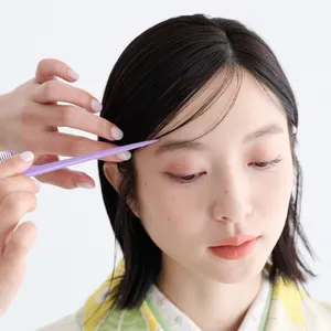 【卒業式袴ヘアアレンジ・ミディアム➀】煌めくパールがアクセントの簡単サイドねじり　STEP３